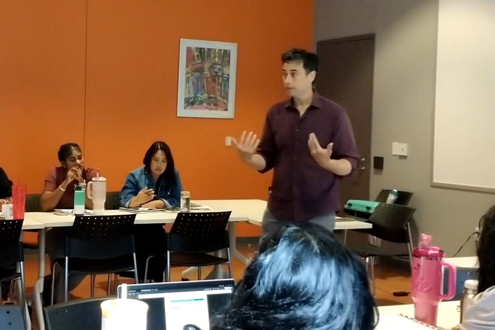 Kenneth Applegate engaging with educators during a training session